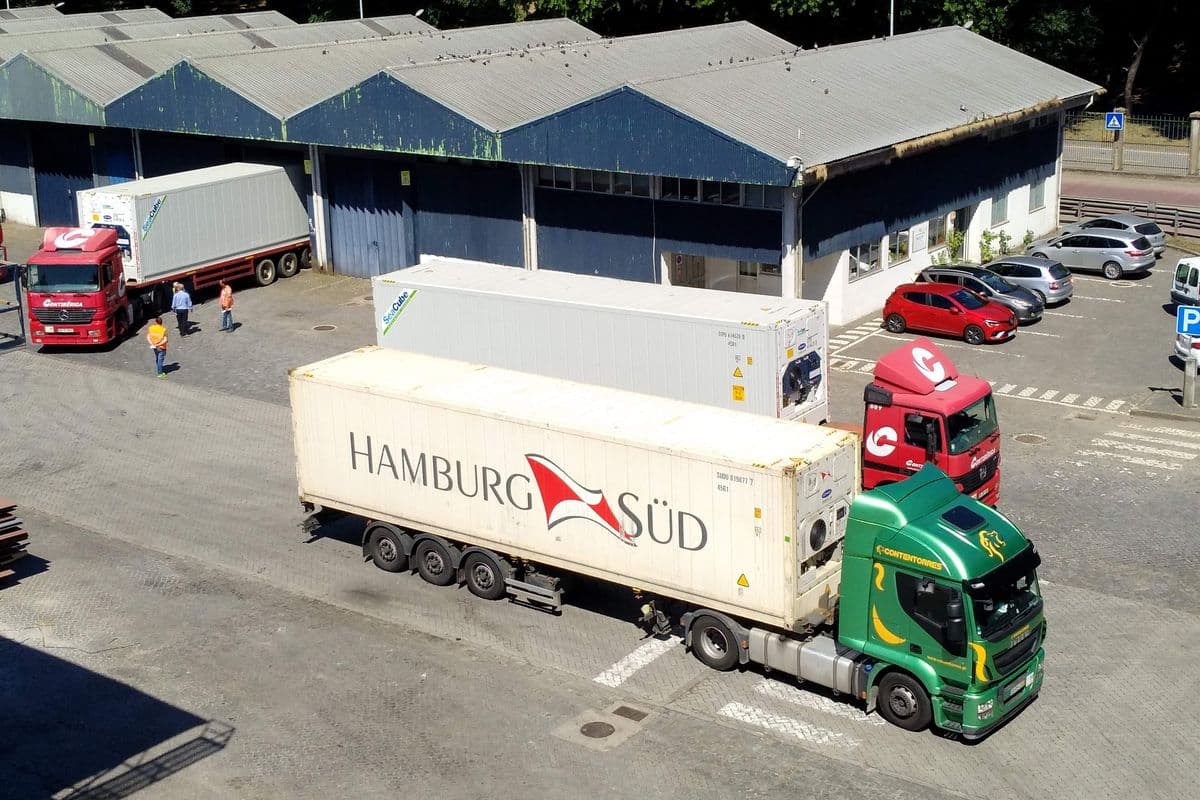 Refrigerated containers on trucks at a port terminal